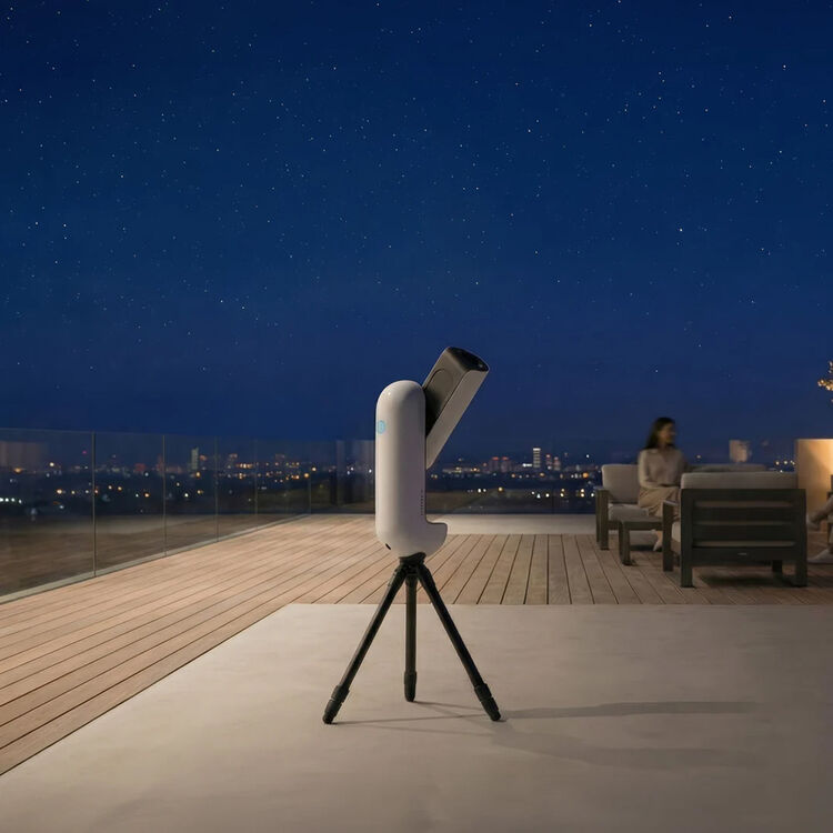 VAONIS Vespera III smart telescope mounted on tripod, showcasing its compact design and user-friendly interface for stargazing.